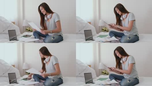 亚洲女性自由职业者工作与笔记本电脑在床上在家里的卧室。在家工作的概念。在家工作概念高清在线视频素材下载