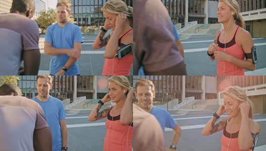 健身女性在和朋友跑步前调整耳机高清在线视频素材下载