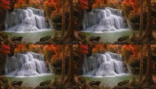 美丽的瀑布在怀美卡明瀑布国家公园森林，泰国北碧府高清在线视频素材下载
