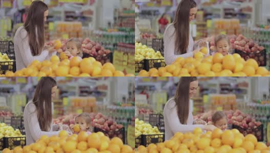 母子俩在超市买水果和蔬菜高清在线视频素材下载