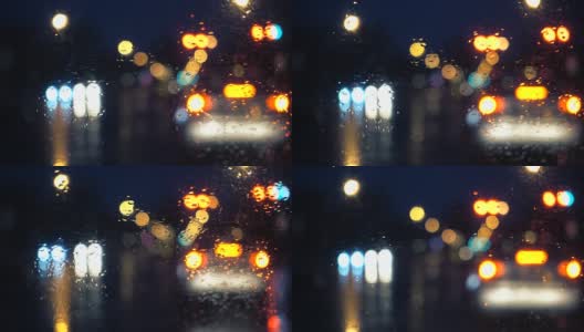 雨夜景从一辆车在红灯高清在线视频素材下载