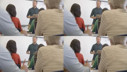 正在上成人教育课的男老师，用R3D拍摄高清在线视频素材下载