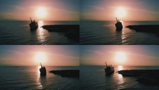 海面上平静的日落。事故后的旧船。地中海。海景与鸟类高清在线视频素材下载