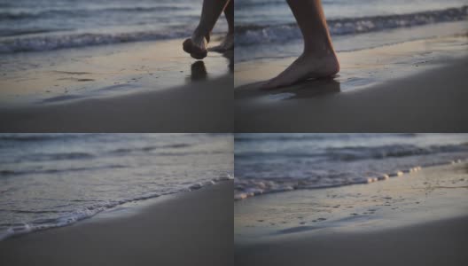 脚在海边的沙滩上留下痕迹，海水会把这些痕迹冲掉高清在线视频素材下载