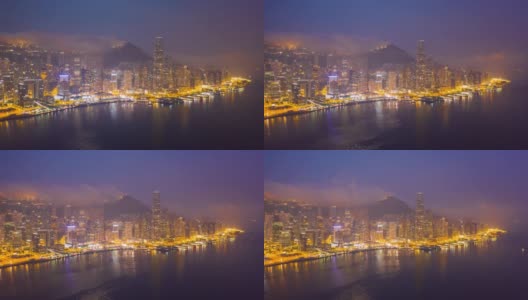 4K Hyperlapse:暮色大厦在城市-鸟瞰图香港摩天大楼与发展建筑，交通，能源基础设施无人机飞行。亚洲金融和商业中心高清在线视频素材下载