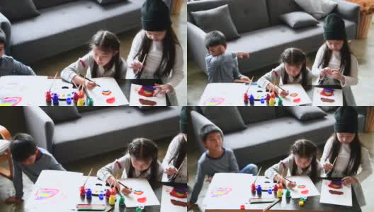 孩子们在客厅里一起画画高清在线视频素材下载
