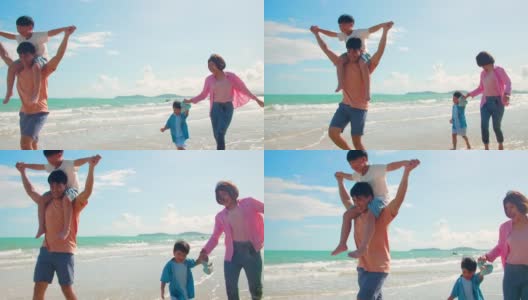 快乐的亚洲家庭在沙滩上奔跑高清在线视频素材下载