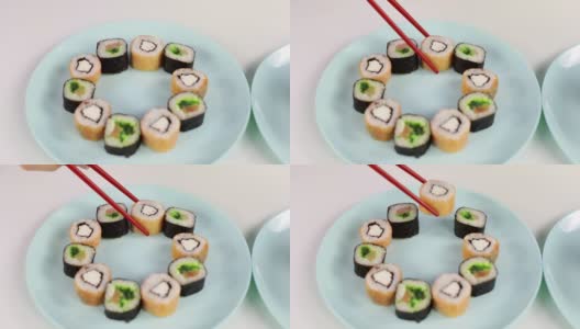美味的寿司在盘子里。高清在线视频素材下载