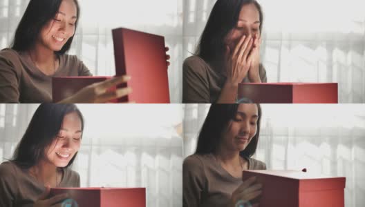 快乐的亚洲女人打开礼品盒高清在线视频素材下载