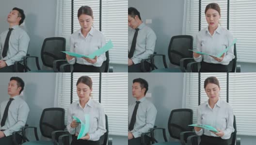 亚洲商务人士为公司面试做准备。有魅力的男女坐在排排的椅子上，和人事经理一起紧张地等待申请工作，一边练习简历。高清在线视频素材下载