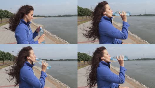 年轻美丽的健身运动慢跑女人站在河边休息喝水补水后有氧运动和训练健康的生活通过户外跑步高清在线视频素材下载