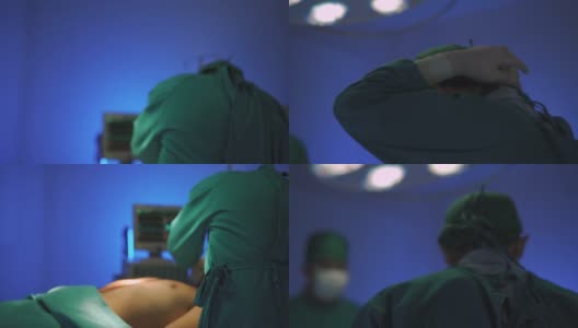 成熟的男性外科医生为病人做手术。高清在线视频素材下载