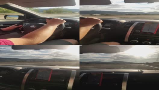 驾车行驶在公路上的阳光山的背景高清在线视频素材下载