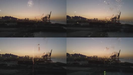 夜晚繁忙的港口，烟花在夜空中燃放高清在线视频素材下载