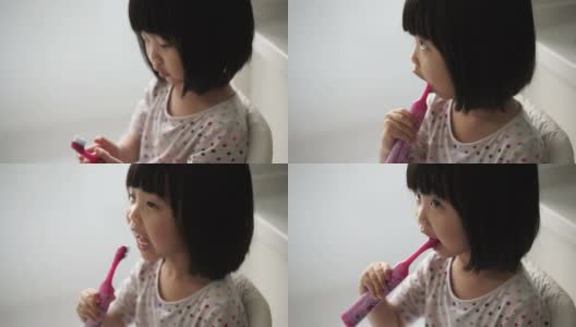 亚洲女孩喜欢她的刷牙程序高清在线视频素材下载