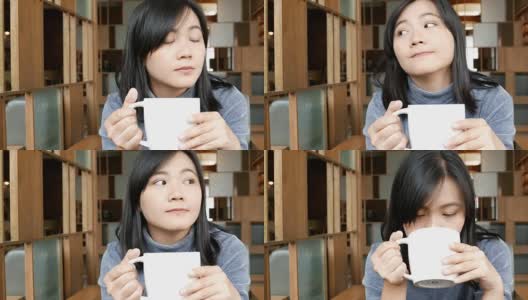 早上在咖啡馆喝咖啡的女人高清在线视频素材下载