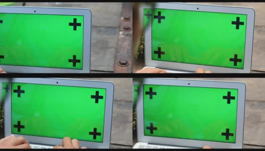 商人正用绿色屏幕的笔记本电脑，高清在线视频素材下载