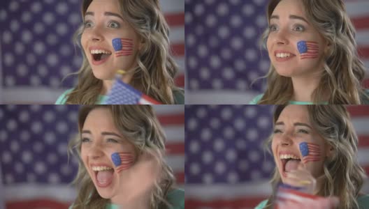 快乐的美国女孩脸上带着微笑，支持候选人，选举高清在线视频素材下载