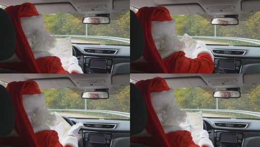 圣诞老人迷路了，正看着地图的背影，每秒50帧高清在线视频素材下载