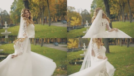 年轻美丽的新娘舞。她穿着一件优雅的白色结婚礼服。慢动作高清在线视频素材下载
