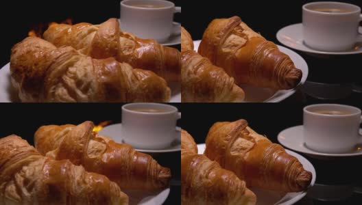 早餐是新鲜烤的羊角面包和咖啡高清在线视频素材下载