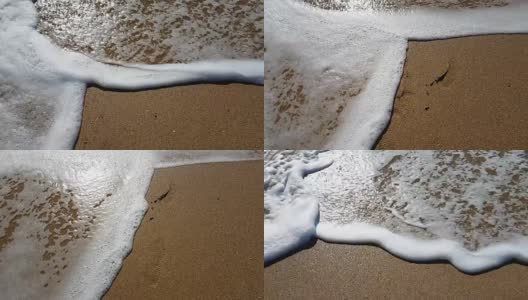 一个海浪向海滩袭来高清在线视频素材下载