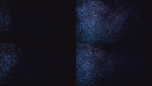 在黑色背景上缓慢移动的蓝色粒子高清在线视频素材下载