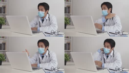 亚洲医生戴上口罩，在办公室通过视频会议对患者进行检查高清在线视频素材下载
