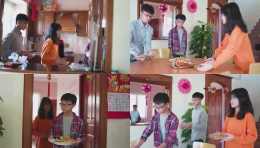 亚洲华人家庭为除夕准备家庭团圆饭高清在线视频素材下载