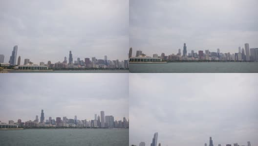 在阴天的黄昏，倾斜到芝加哥的天际线与密歇根湖滨水区。高清在线视频素材下载