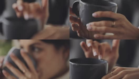 女人手里拿着杯子喝着茶，走近了高清在线视频素材下载