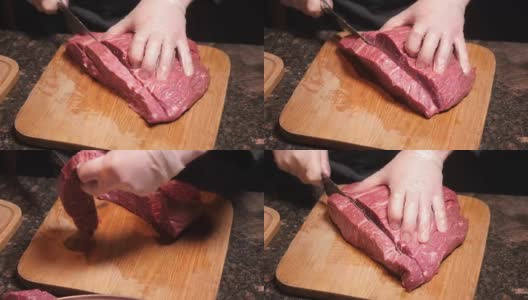 厨师在木板上切肉。餐厅里的新鲜生肉。有选择性的重点。高清在线视频素材下载