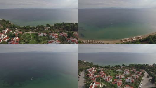 度假区有别墅，在广阔的蓝色海岸，空中高清在线视频素材下载