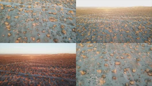 鸟瞰图。日落时分的沙漠。高清在线视频素材下载