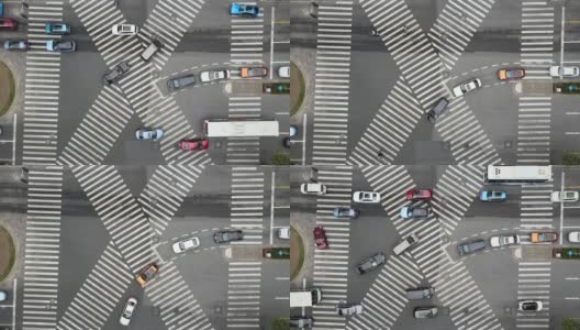 无人机鸟瞰图的十字路口与人和交通车辆在市中心高清在线视频素材下载