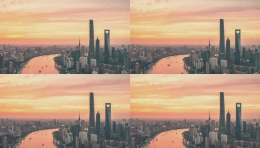 时间推移航拍视频的上海城市天际线在黄昏与戏剧性的天空高清在线视频素材下载
