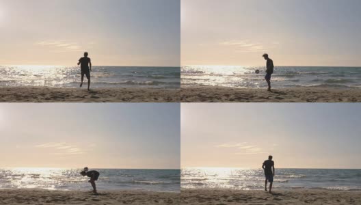 年轻男子在游泳裤做特技运球弹跳足球在海边在日落的海滩剪影高清在线视频素材下载