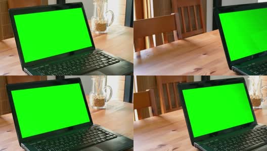 摄影:客厅木桌上的笔记本电脑，绿屏色度键高清在线视频素材下载