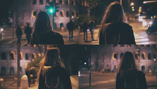 后视图的深色头发的女人走在深夜在罗马，意大利。女孩在斗兽场附近的人行横道上过马路高清在线视频素材下载