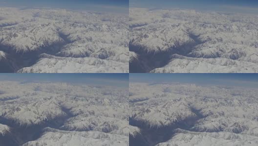 从西藏鸟瞰喜马拉雅山。从飞机窗口观看高清在线视频素材下载