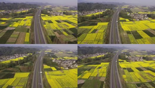 鸟瞰图的中国乡村景观在春天油菜种子盛开和村庄在高速公路高清在线视频素材下载