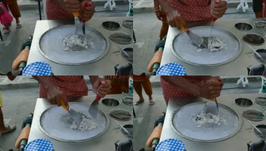 亚洲厨师在煎锅上制作冰淇淋高清在线视频素材下载