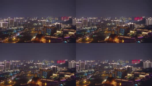 夜晚照亮三亚市风景著名的大东海酒店屋顶全景4k时间推移海南岛中国高清在线视频素材下载