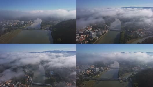 鸟瞰图度假小镇皮埃斯塔尼和温泉岛在阳光明媚的夏天早晨与轻雾，斯洛伐克。高清在线视频素材下载