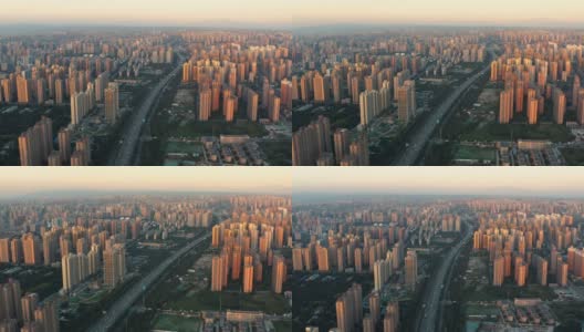 日落时城市景观的鸟瞰图高清在线视频素材下载
