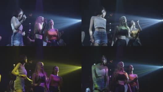 三个女人在夜总会跳舞欢呼，慢镜头高清在线视频素材下载