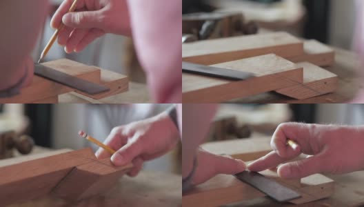 木匠在木板上画了一个方格。方形框架是用来用铅笔在木板上做记号的。用铅笔做个记号。高清在线视频素材下载