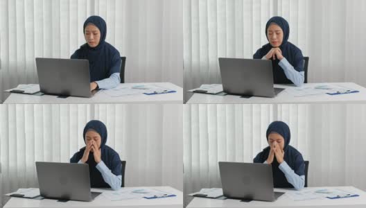 阿拉伯商业女性由于在办公室的辛苦工作而感到压力和疲惫高清在线视频素材下载