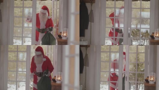 圣诞老人敲门进入屋子(慢镜头)高清在线视频素材下载