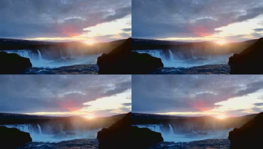 美妙的日落。荷达福斯瀑布非常美丽，高达12米。它位于北部靠近Myvatn湖高清在线视频素材下载